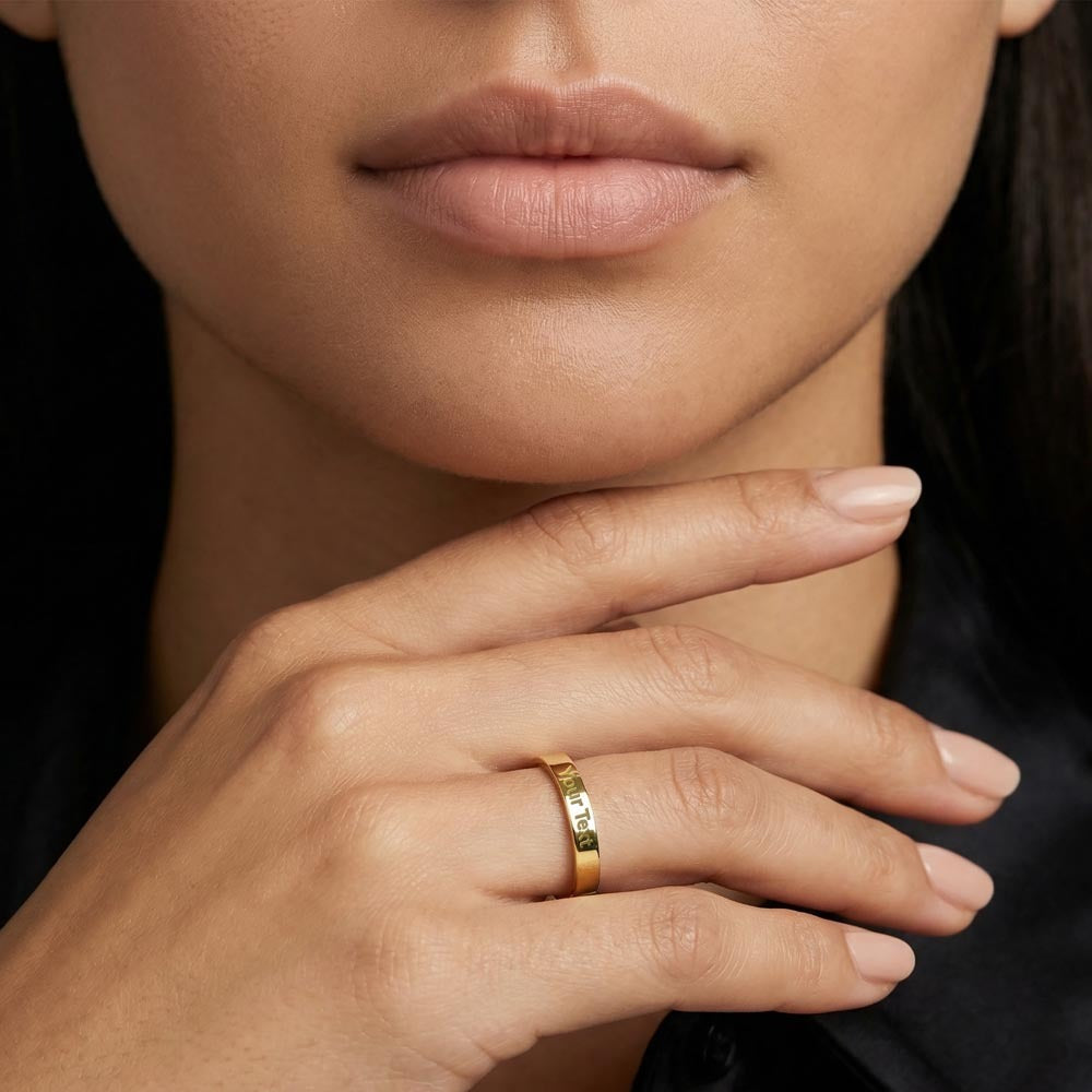 Precious treasure - An engraved Ring with your special message, gold and silver.