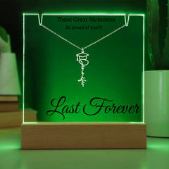 Graduation Cap Name Necklace with Engraved Acrylic stand backlit with LED lights.