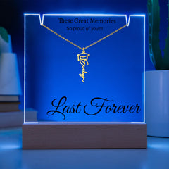 Graduation Cap Name Necklace with Engraved Acrylic stand backlit with LED lights.